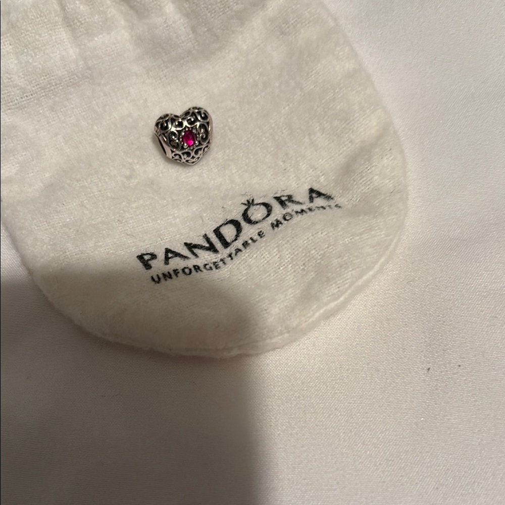 Pandora Heart Charm with burgundy gems on both sides
